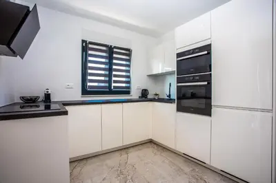 Kuhinja ili čajna kuhinja u objektu Apartman sa prekrasnim pogledom,potpuno opremljen za 4 osobe