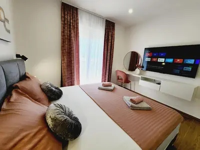 TV i/ili zabavni centar u objektu Luxury Penthouse White Angel