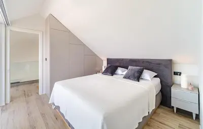 Krevet ili kreveti u jedinici u objektu Awesome Home In Splitska- Supetar