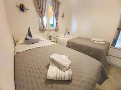 Krevet ili kreveti u jedinici u objektu Luxury two-bedroom apartment by the sea U KaLu