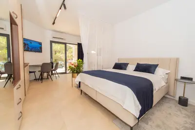 Krevet ili kreveti u jedinici u objektu More Medici Apartments