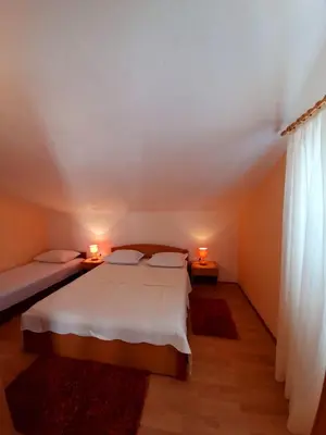 Krevet ili kreveti u jedinici u objektu Apartments and Rooms Jasna