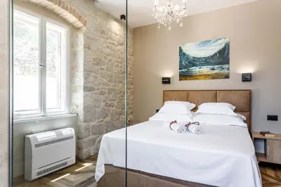 Krevet ili kreveti u jedinici u objektu Phenomenal Pucisca Villa Lighthouse St Nicholas 2 Bedrooms Floor Heating