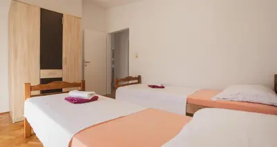 Krevet ili kreveti u jedinici u objektu Plava Adria Podstrana