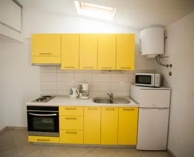 Kuhinja ili čajna kuhinja u objektu Apartments Trešnja