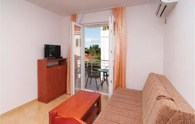 TV i/ili zabavni centar u objektu Apartment Supetar 43