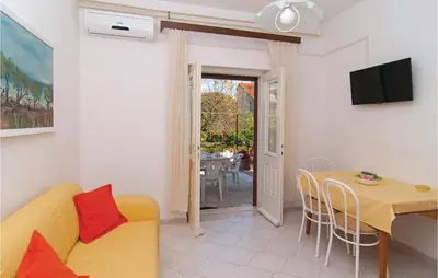 TV i/ili zabavni centar u objektu Apartment Supetar 49