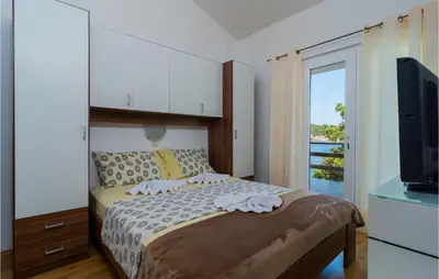 Krevet ili kreveti u jedinici u objektu Holiday Home Zastrazisce 13