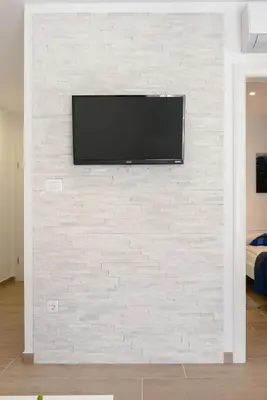 TV i/ili zabavni centar u objektu Apartments Villa Tudor 2