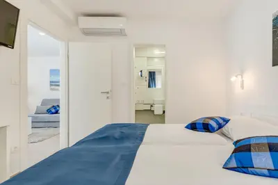 Krevet ili kreveti u jedinici u objektu Apartments Villa Tudor 2