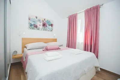 Krevet ili kreveti u jedinici u objektu Apartments Salsa