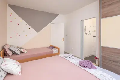 Krevet ili kreveti u jedinici u objektu Apartments Ivan
