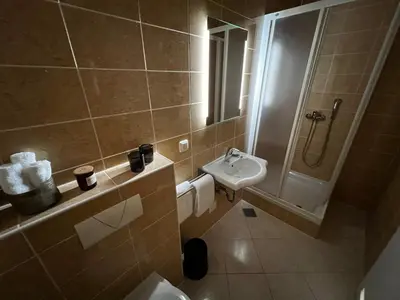 Kupaonica u objektu Kavajin Rooms