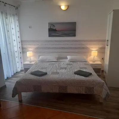 Krevet ili kreveti u jedinici u objektu Beach pearl 1
