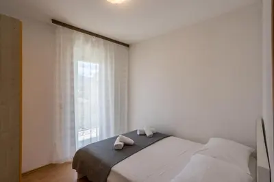Krevet ili kreveti u jedinici u objektu Apartment Tihana
