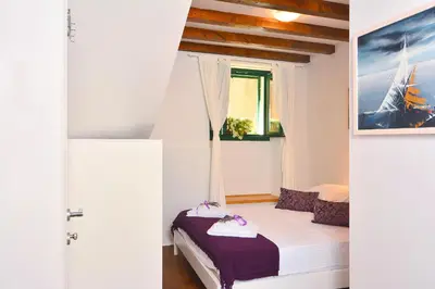 Krevet ili kreveti u jedinici u objektu Apartments and Rooms Kampanel