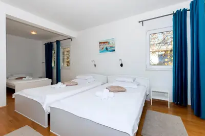 Krevet ili kreveti u jedinici u objektu Villa Mermaid - Heated Pool, Sea Views & Beach 120m I Split Riviera