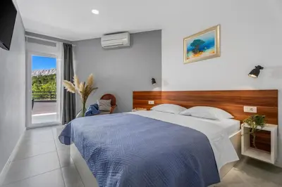 Krevet ili kreveti u jedinici u objektu Villa UP with panoramic views of picturesque landscape and sea