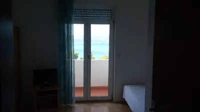 TV i/ili zabavni centar u objektu Apartments Filip