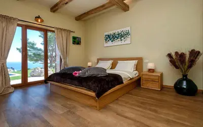Krevet ili kreveti u jedinici u objektu Astounding Hvar Villa 4 Bedrooms Villa Crystal Hvar 1 Mesmerizing Sea View