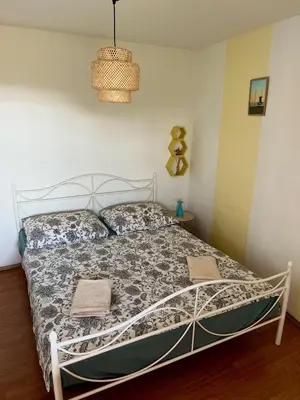 Krevet ili kreveti u jedinici u objektu Garden Apartment