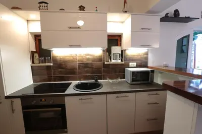 Kuhinja ili čajna kuhinja u objektu Cottage Holiday Home
