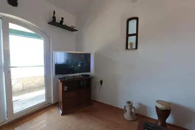 TV i/ili zabavni centar u objektu Cottage Holiday Home