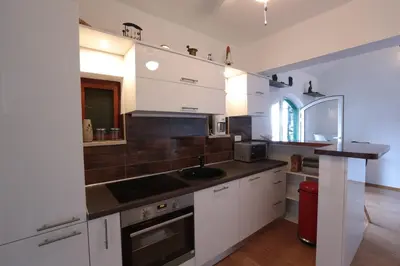 Kuhinja ili čajna kuhinja u objektu Cottage Holiday Home