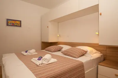 Krevet ili kreveti u jedinici u objektu Apartments Mistral