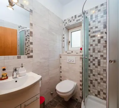 Kupaonica u objektu Sun Blue Apartment