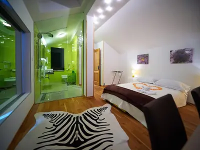 Krevet ili kreveti u jedinici u objektu Villa Maranata-5 stars-pool-spa-gym-free parking-privacy