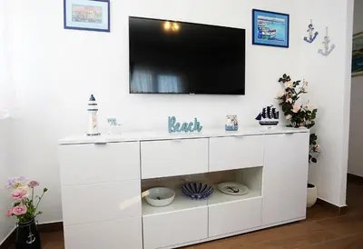 TV i/ili zabavni centar u objektu Apartment Romarin