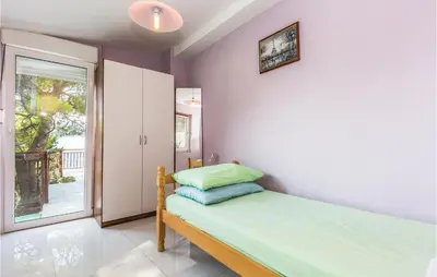 Krevet ili kreveti u jedinici u objektu Holiday Home Brela 55