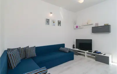 TV i/ili zabavni centar u objektu Holiday Home Gata 15