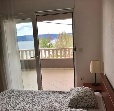 Krevet ili kreveti u jedinici u objektu Apartments Marta