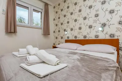 Krevet ili kreveti u jedinici u objektu Apartments Tonko