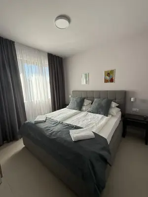 Krevet ili kreveti u jedinici u objektu DINORA Exclusive Apartments