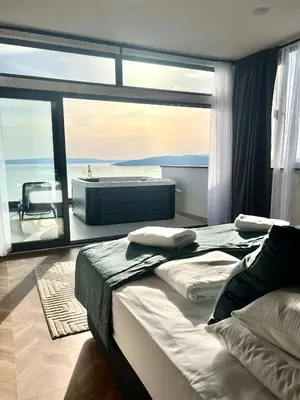 Krevet ili kreveti u jedinici u objektu DINORA Exclusive Apartments