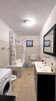 Kupaonica u objektu Apartment Lekse near ACI
