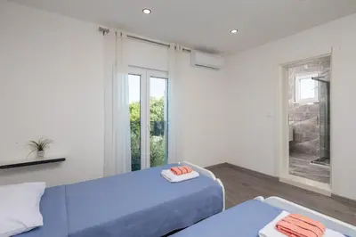 Krevet ili kreveti u jedinici u objektu Villa Paradiso