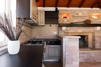 Kuhinja ili čajna kuhinja u objektu VILLA AGAPE - Three bedroom villa on 15k m2 olive grove - Incredible 360 view - Free parking - Private pool and jacuzzi
