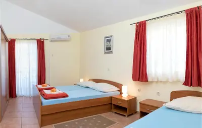 Krevet ili kreveti u jedinici u objektu Beach Front Apartment In Baska Voda