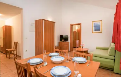 TV i/ili zabavni centar u objektu Beach Front Apartment In Baska Voda