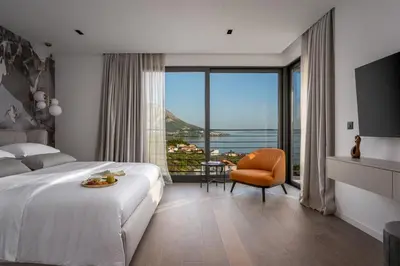 Krevet ili kreveti u jedinici u objektu Deluxe Villa Nitia with 4 bedrooms 550m from sandy beach