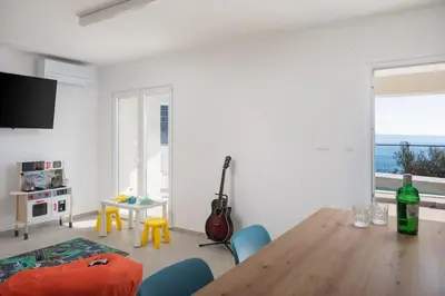 TV i/ili zabavni centar u objektu Modern Villa Maris - with heated pool & sea view