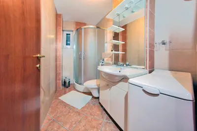 Kupaonica u objektu Apartments Sumic