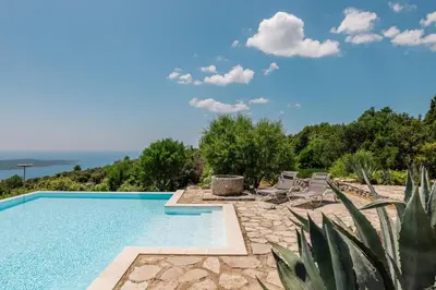 Bazen u objektu Outstanding Hvar Villa 4 Bedrooms Villa Dvori Pogled Tennis Court ili u blizini