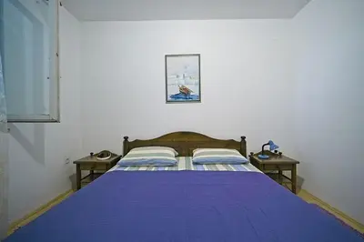 Krevet ili kreveti u jedinici u objektu Apartments by the sea Postira, Brac - 22158