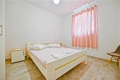 Krevet ili kreveti u jedinici u objektu Apartments with parking spaces Postira, Brac - 22150