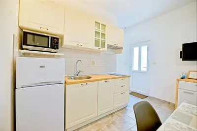 Kuhinja ili čajna kuhinja u objektu Apartments with parking spaces Postira, Brac - 22150